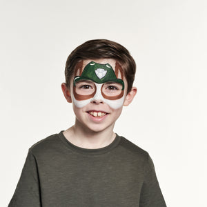 Step two, Using a brush, painting brown circles around the eyes and the outside of the ears, then painting white down the centre of the nose and the bottom of the cheeks.