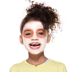 Step two, using orange paint, adding circles around the eyes.