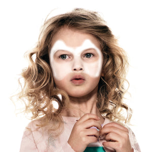 Step one, showing the start of creating white mask shape around eyes, nose and cheeks.