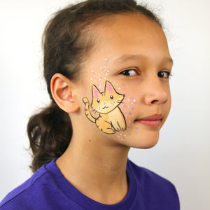 Final step, adding pale pink and white dots to complete Orange Cat face paint.