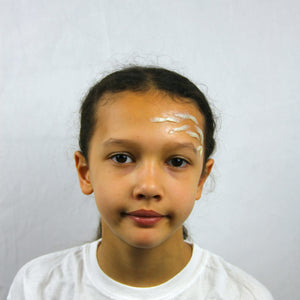 Step one, creating bumps on forehead using special effect wax.