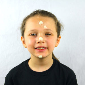 Step one, showing the start of creating warts on face using Special effect wax.