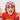 small boy in a red t-shirt with red baseball cap with big blue dinosaur eyes stuck on the frint 