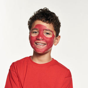 Step one, showing the start of painting entire face with red face paint avoiding eyes and mouth.