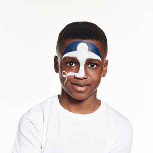Step two, Using classic dark blue, apply a semicircle of paint on the forehead above the ghost.