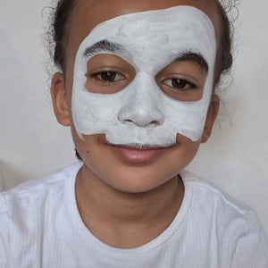 Step one, Creating a half skull shape with white, leaving spaces for the eyes, and filling in with the same paint colour.