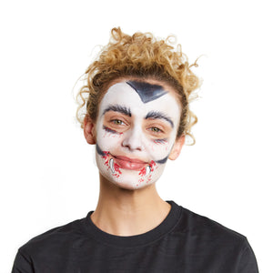 Draw fangs on the lip in black and add red blood around the mouth and eyes with a brush.