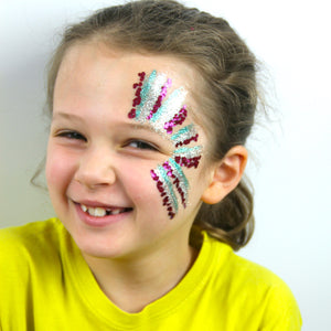 Step two, Adding chunky fuchsia glitter in stripes.